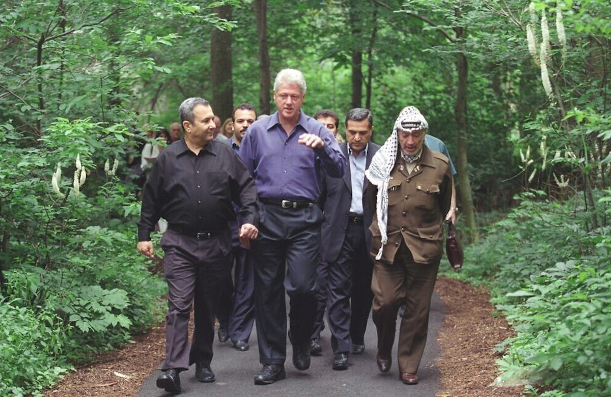 Ehud Barak, Bill Clinton, and Yasser Arafat at Camp David.